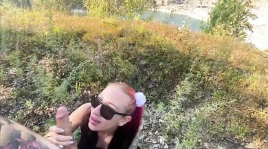 Redhead slut gives outdoor blowjob and gets doggystyle fuck