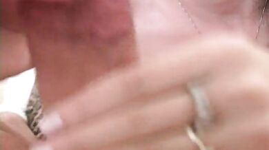 She gives a long handjob before he cums on her face