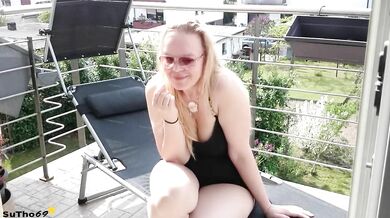 Curvy Blonde Playing On Balcony