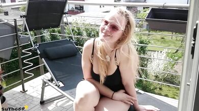 Curvy Blonde Playing On Balcony