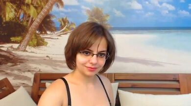 Cutie camgirl with glasses spreads to show pussy and soft tities
