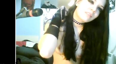 English brunette gets naked and fingers on webcam