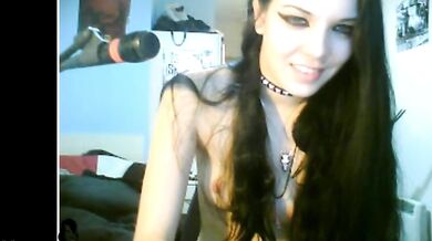 English brunette gets naked and fingers on webcam