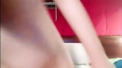 Slutty amateur MILF gets naked on her bed and opens up her pussy