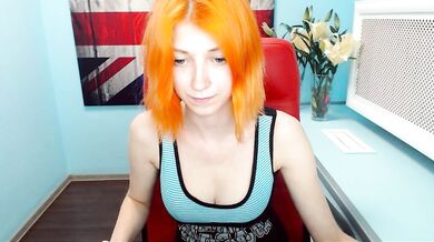 Bright orange haired camgirl strips and plays smoking a cigarette