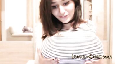 Big tits camgirl bounces them as she fingers her smooth pussy