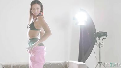 Beautiful brunette model spreads her cheeks and gets her asshole